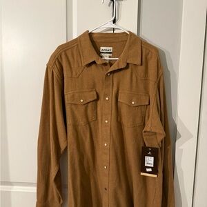 Bundle of men’s button down shirts and pair of Nike shorts.
